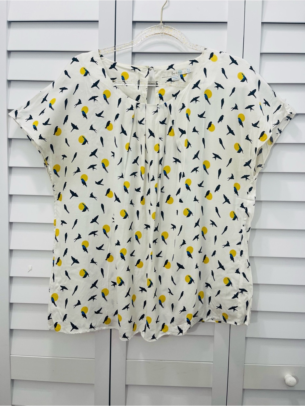 Boden Women's Cream Short-Sleeve Blouse with Yellow Moon and Bluebird Print.